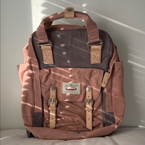 best sling travel backpack for left handed M-Tac 10L Tactical - Crossbody Medical Sling EMS Bag EDC with Loop Panel Concealed Carry feature:ID TheftBlock Pocket Size:18”x14”X7” The North Face Borealis Fits most handguns